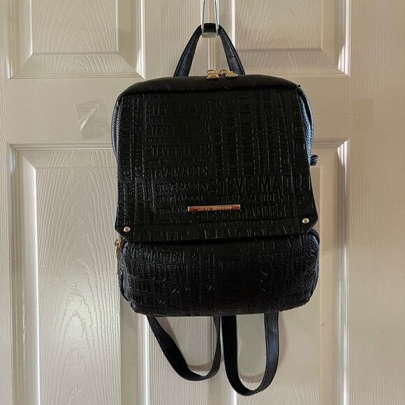 Steve Madden Handbags - Steve Madden Black synthetic embossed small backpack gold tone hardwares.